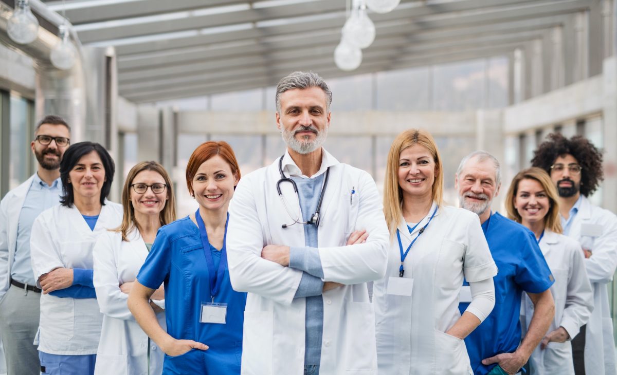 group-of-doctors-standing-in-hospital-on-medical-conference-.jpg group-of-doctors-standing-in-hospital-on-medical-conference-.jpg